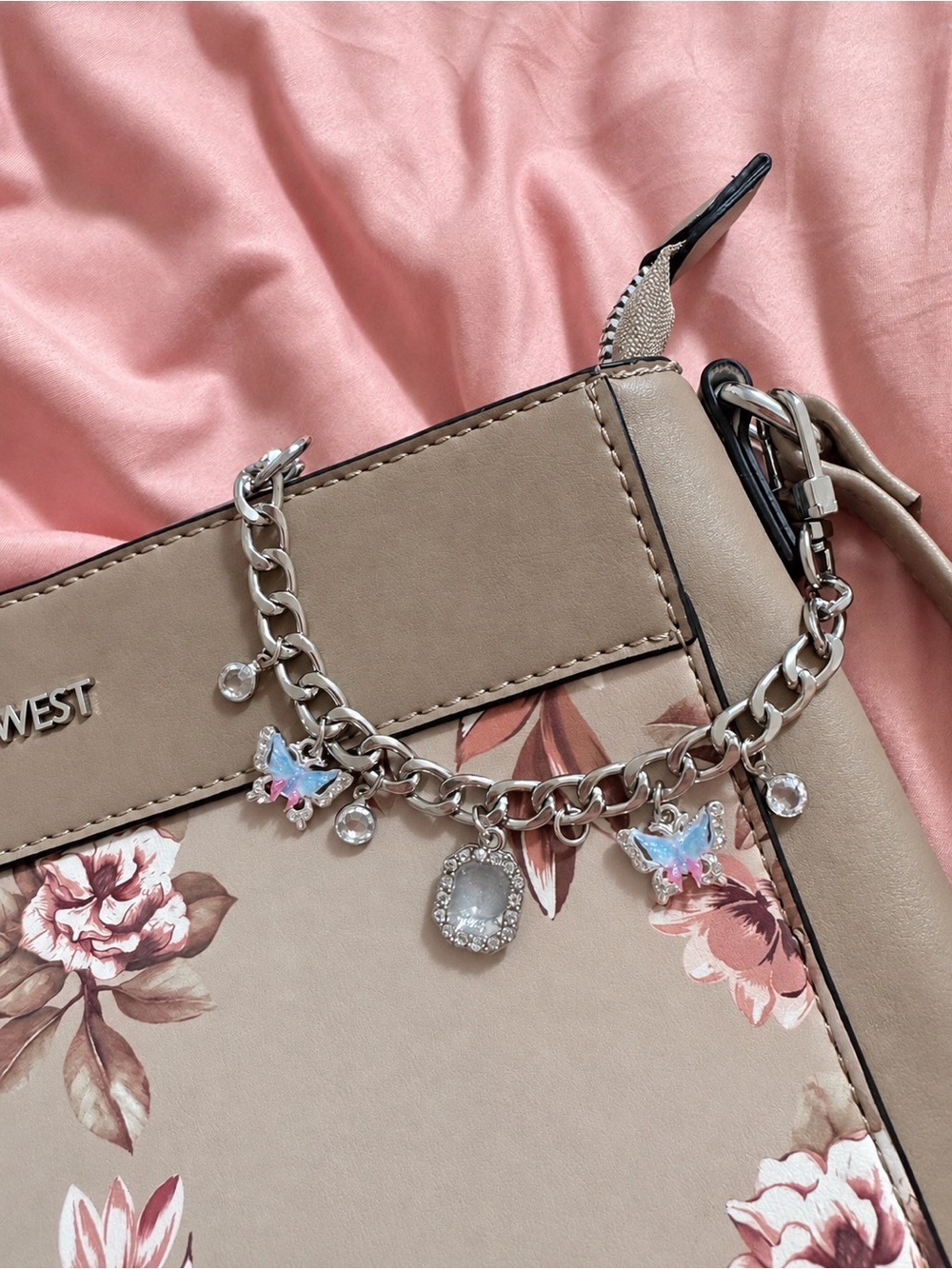 Butterfly and crystal purse charm.